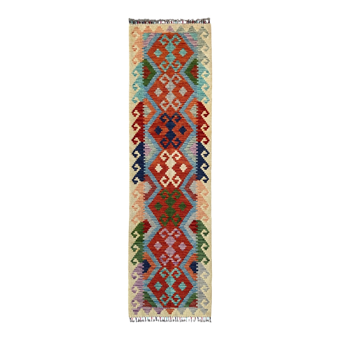 A 2 meters long, 2 feet narrow kilim runner rug with a vibrant geometric pattern in red, blue, green, purple, and orange on a cream background, shown flat against a white background.