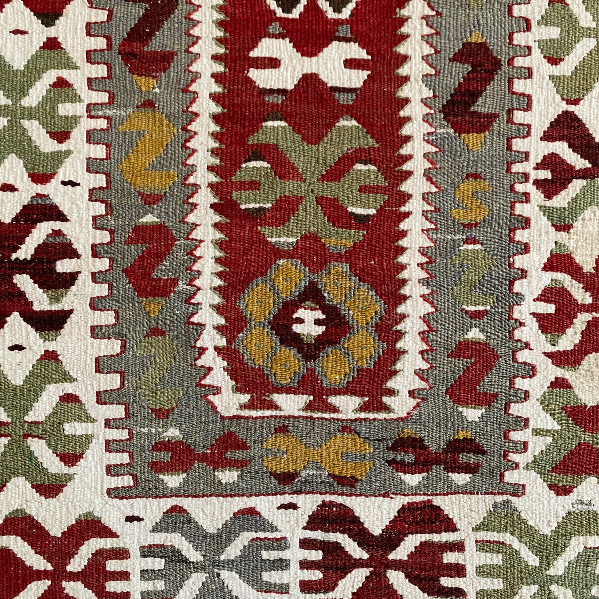 Close up mihrab detail of Kula Ghordes prayer kilim rug with traditional motifs