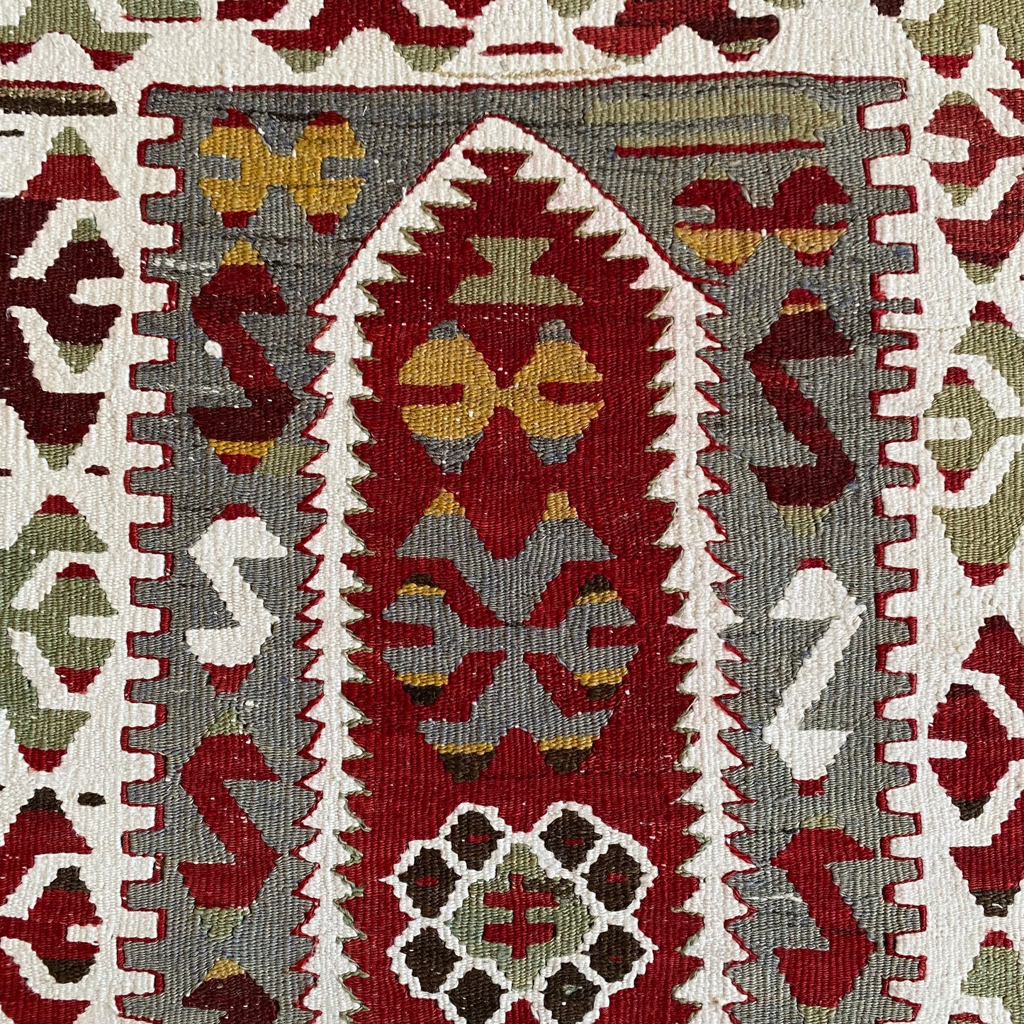 Close up mihrab detail of Kula Ghordes prayer kilim rug with traditional motifs