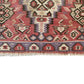Lower border and fringe detail of vintage Kurdish Senneh kilim rug handwoven from wool