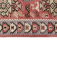 Detailed view of symbolic geometric patterns on Kurdish Senneh kilim rug
